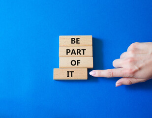 Be part of it symbol. Concept words Be part of it on wooden blocks. Beautiful blue background....