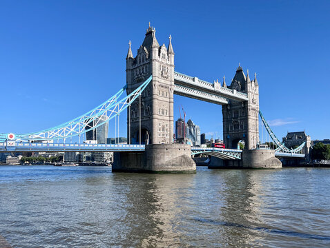 Tower Bridge and the River Thames from Thames Path at Butler's Wharf, Shad Thames, South Bank, London, England, UK