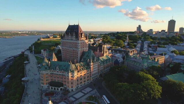 Sunset over a castle towering over an old city