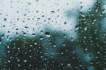 Sun after rain. Drops on glass. It's been raining. Texture on glass.