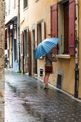 Lonely girl with an umbrella