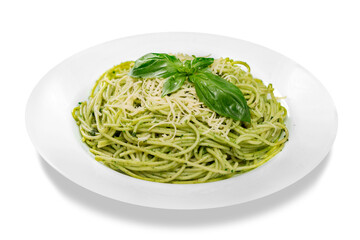 Italian pasta spaghetti with pesto sauce and basil leaf close-up