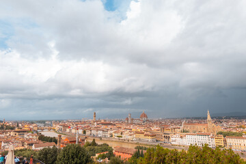 Fototapeta na wymiar Amazing panoramic view of a beautiful city on a cloudy day, Florence, Italy
