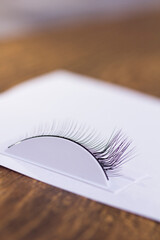 The process of training eyelash extension 3d close-up on a white background