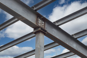 Metal structures on the construction of a house.Fastening of metal structures to the foundation.