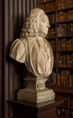 Bust of Doctor Robert Clayton in Long Room of Trinity College Old Library in Dublin