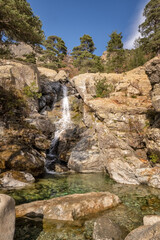 Cascade des Anglais falls into natural pools at Vizzavona alongside the GR20 trail in Corsica