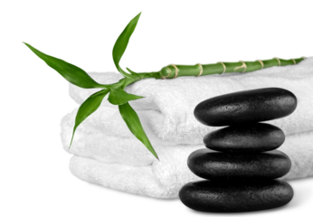 Spa concept with zen basalt stones and towels