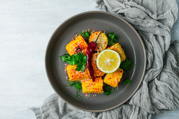 grilled corn with spices, top view, no people, homemade,