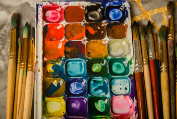 Paints and brushes for painting. Children's creativity, art