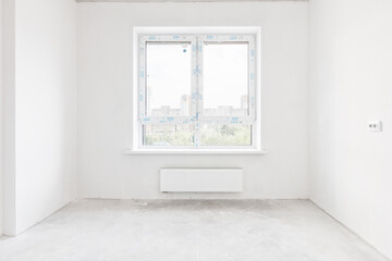 interior of the apartment without decoration in gray colors