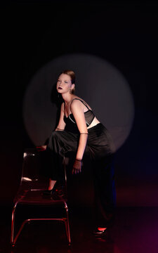 studio photo of a girl on the background with a gobo mask