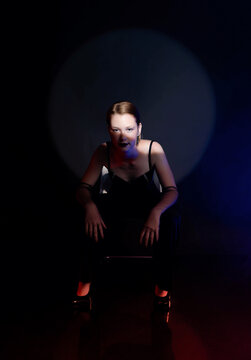 studio photo of a girl on the background with a gobo mask