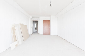 interior of the apartment without decoration in gray colors