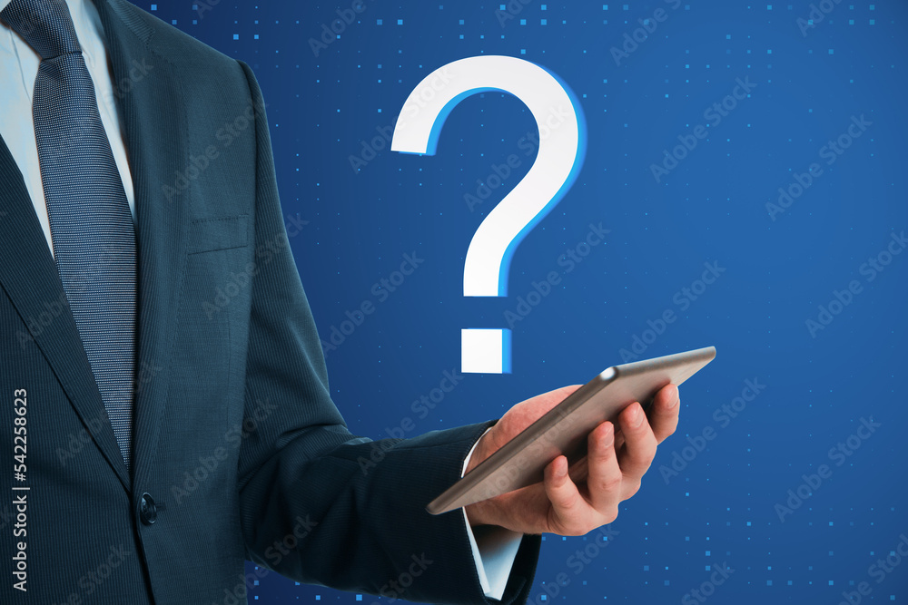 Poster close up of businessman hand holding mobile phone with abstract digital question mark on blue backgr