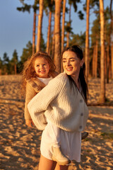 Family on the beach in autumn