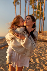 Family on the beach in autumn