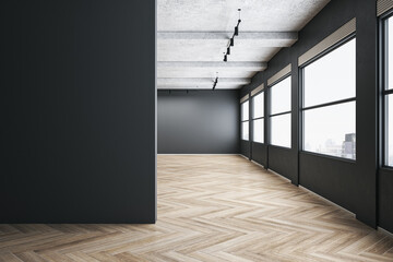 Modern spacious concrete gallery interior with empty mock up place on wall, wooden flooring and...