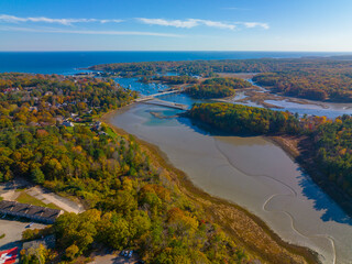 York River aerial view in fall and Wiggly Bridge at Barrell Mill Pond Dam near the river mouth to the York Harbor, town of York, Maine ME, USA. 