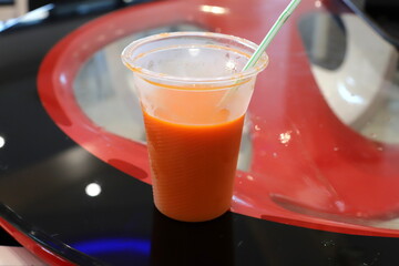 A non-alcoholic soft drink is poured into a glass.