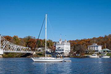 Sailing on the Connecticut River near the landmarks of the East Haddam Swing Bridge, the Goodspeed...
