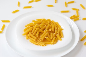 Penne pasta in white plate