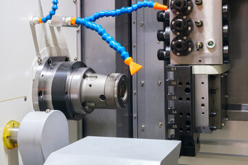 Manufacturing CNC professional lathe machine, Industrial concept.