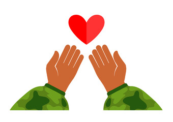 A military mans hands holds a heart