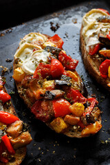 Sandwich with the addition of vegetable ratatouille and goat cheese sprinkled with aromatic fresh...