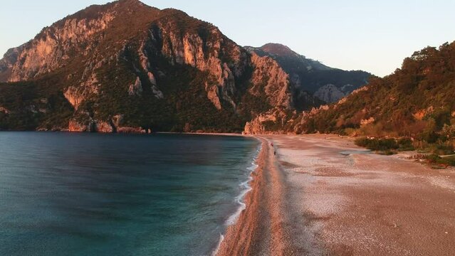 View from above to Cirali beach and Olimpos mountain in a sunset light. Kemer, Antalya, Mediterranean region, Turkey, Lycia.