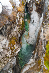 Looking down to a glacial river running through marble canyon