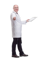 qualified mature doctor with clipboard .isolated on a white background.