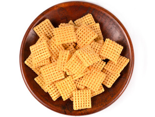 corn flakes in a plate on a white background
