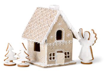 Homemade gingerbread house on brown background