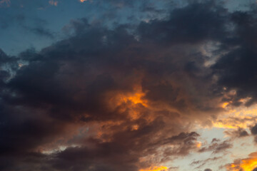 Dramatic cloudscape at sunrise. Cinematic clouds in the morning