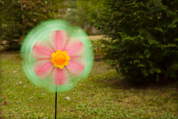 Colorful pinwheel spinning in the wind.