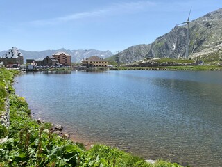 Obraz premium Summer atmosphere on the Lago della Piazza lake (Lake of the Piazza) in the Swiss alpine area of the mountain St. Gotthard Pass (Gotthardpass), Airolo - Canton of Ticino (Tessin), Switzerland (Schweiz