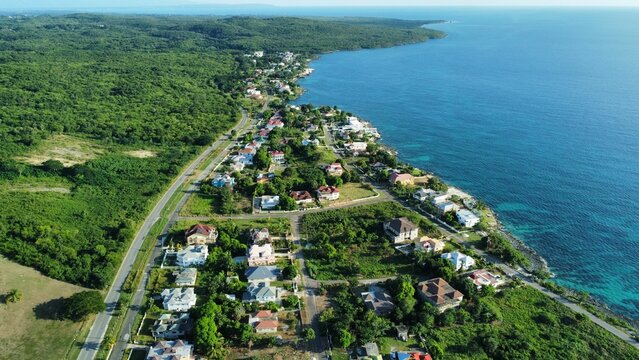 Aerial Drone View Of The Townscape Of Whitehouse With A Beautiful Coast And Greenery