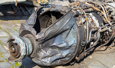 Burnt parts of the destroyed Russian Air Force combat helicopter Hind Crocodile. The wreckage of a downed helicopter. War in Ukraine. Broken military attack helicopter close-up.