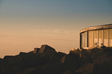 Glass structure with cliffs at dawn in Pesaro in the Marche region of Italy