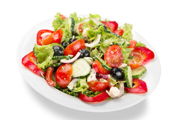 Greek salad with fresh vegetables on background