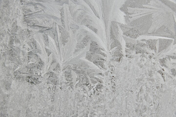 frost on the glass, frost, cold, temperature decrease patterns on the window.