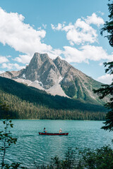 Kayak on the Blue lake Emerald in the Canadian Rocky Mountains