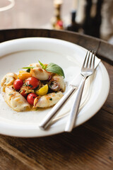 Stylish serving of food in the restaurant. Serving. Waiter