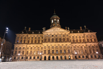 Amsterdam, Netherlands: Royal Palace. Main square in city centre at night. Dam Square.