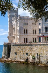 Vertical of the beautiful Miramare Castle in Italy on a sunny day