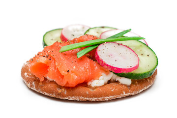 Crispy Cracker Sandwich with Salmon, Cucumber, Radish, Cottage Cheese and Green Onions - Isolated on White. Easy Breakfast. Quick and Healthy Sandwiches. Crispbread with Tasty Filling - Isolation