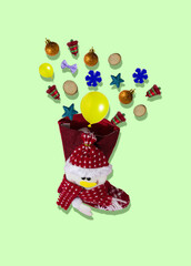sock for Santa Claus, Christmas decorations fall out of it, creative holiday concept
