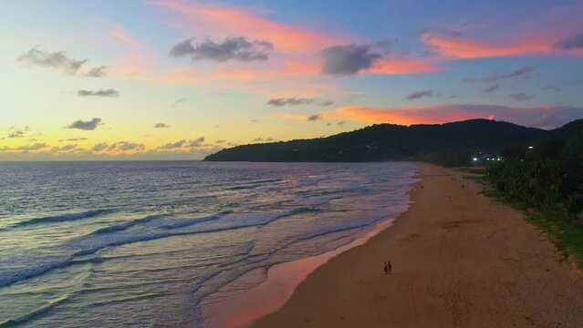aerial view sweet sky in sunset above the ocean at Karon beach Phuket. .abstract nature background..Sunset with sweet color light rays and other atmospheric effects..aerial photography 4k resolution.