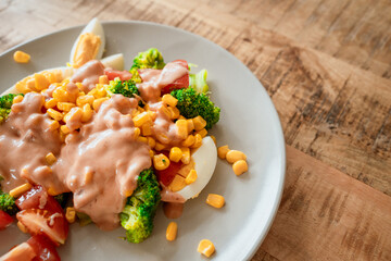 eggs with sweet corn, mayo sauce and broccoli